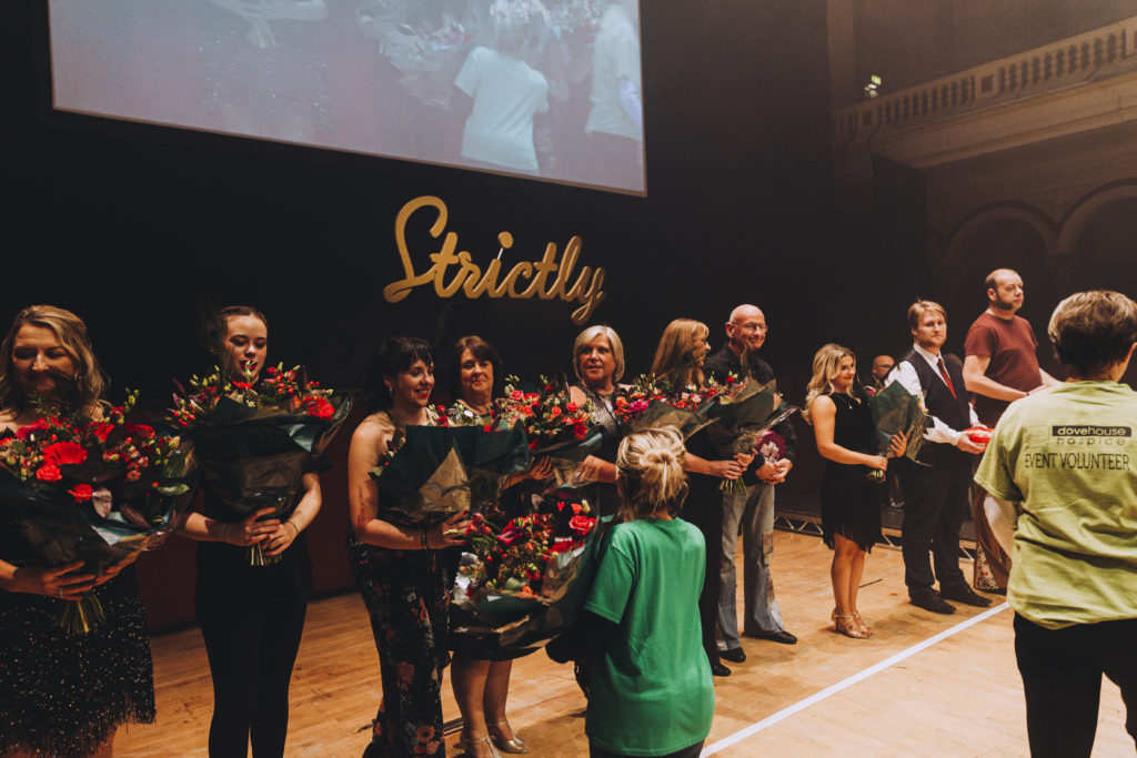 Contestants are presented with bouquets donated by JZ Flowers at the Strictly Learn to Dance event