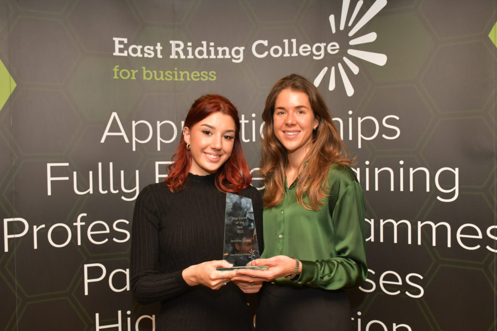 Jenny Green (left), HR Advisor at JZ Winners, receives her Apprentice of the Year award with JZ Flowers Managing Director Tessa Zwemstra